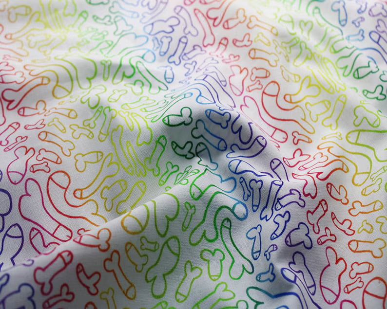Close-up of Cockadoodle rainbow outline print