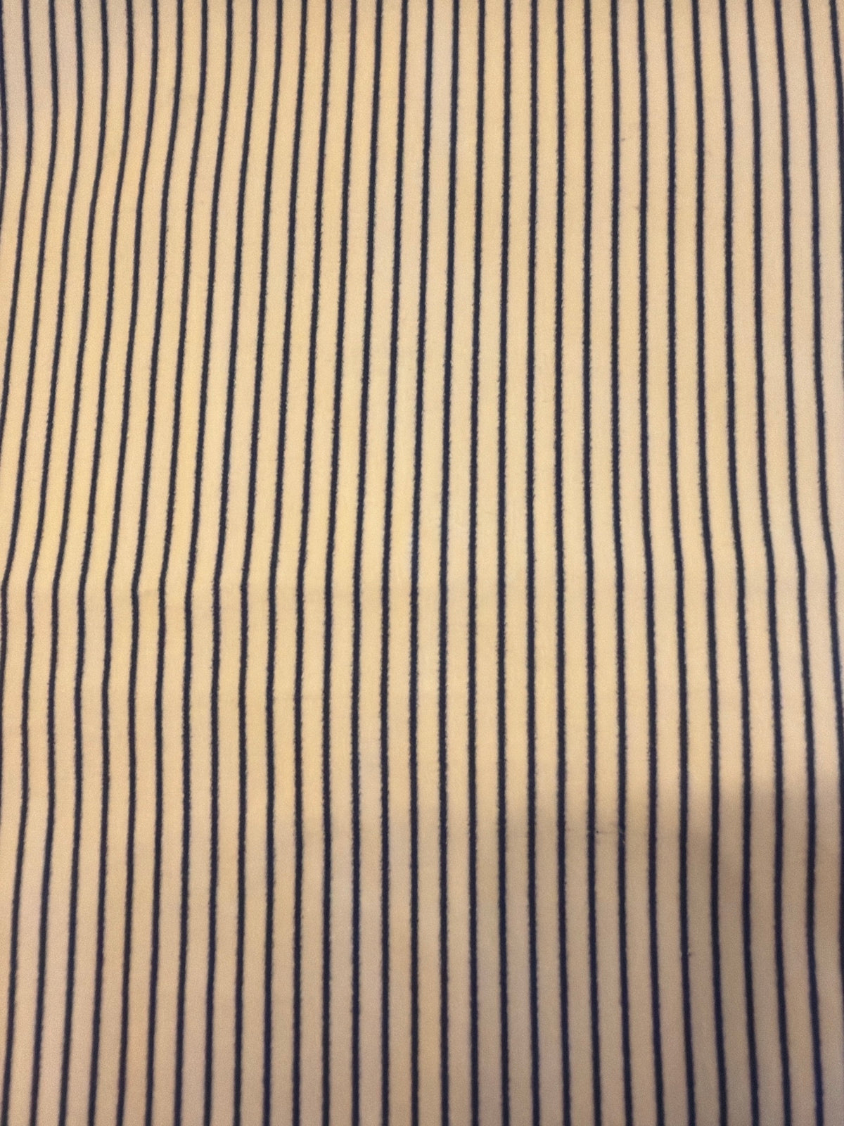 Close-up of Navy on Cream Pinstripe suiting